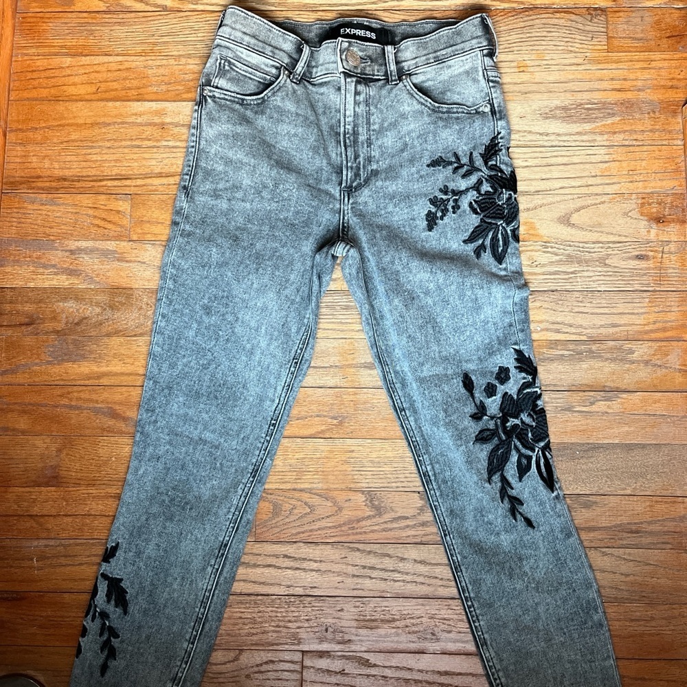 Black Acid Washed Express Jeans with embroidery detail throughout